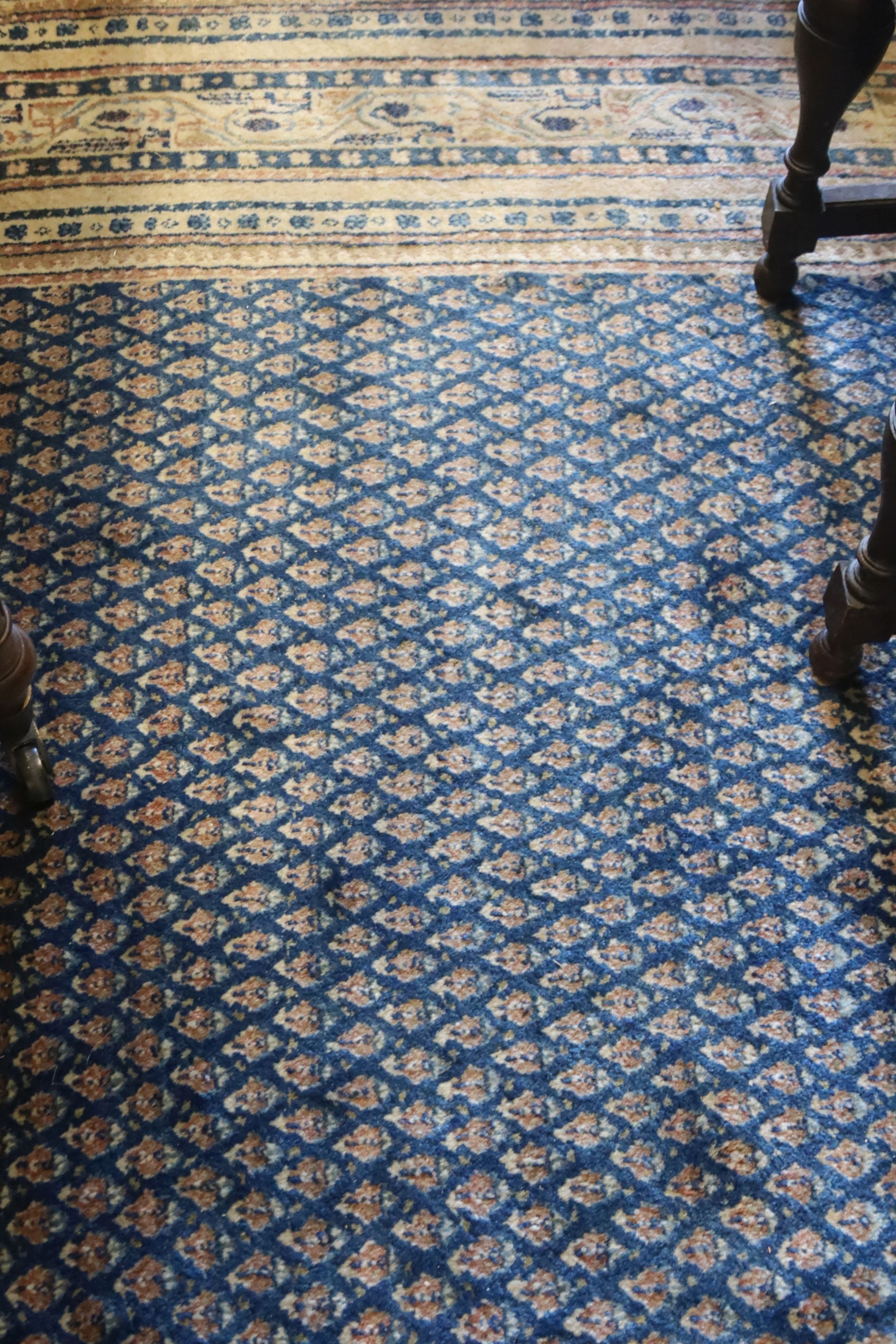 A Tabriz blue ground carpet